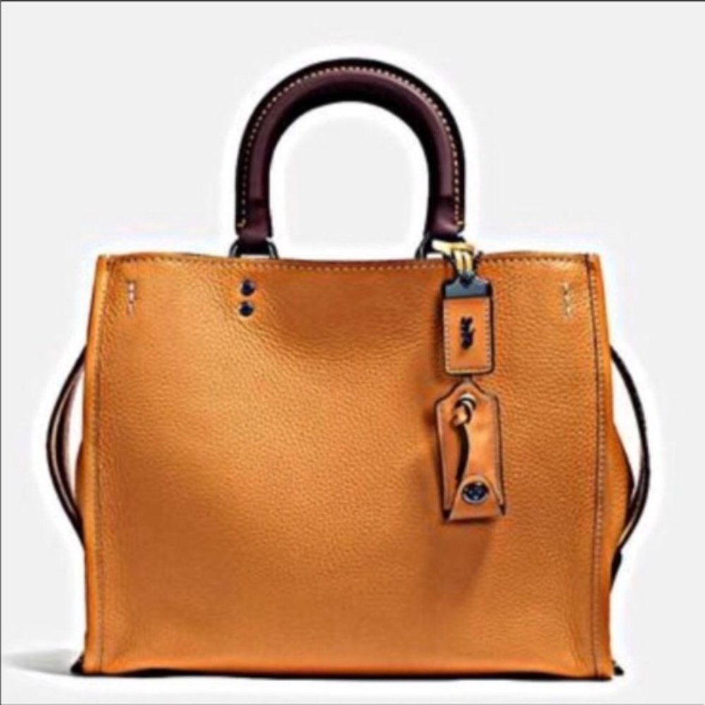 ISO SEARCHING FOR Coach Rogue Butterscotch